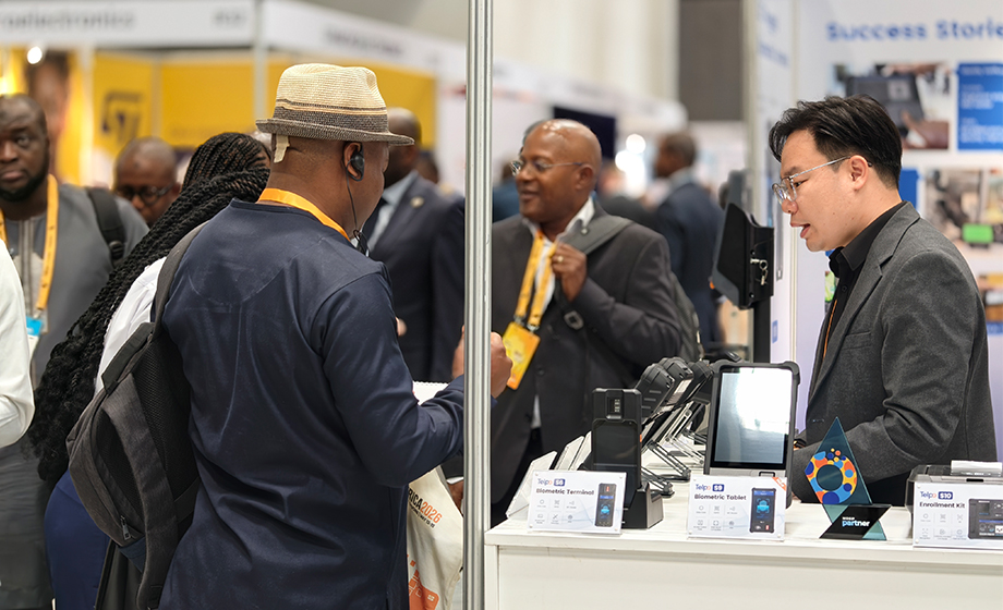 Visitors exploring Telpo wireless biometric machine and smart terminal solutions at ID4Africa 2026 booth